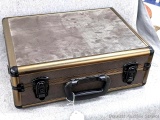 Lockable hard case with keys and carry strap would be nice for handguns. Measures about 17