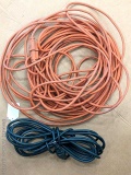 Very long and short extension cords in good condition, one of each to fit any situation.