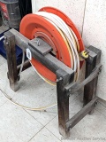 Spool of 300 volt, 3 cond, #14, Type SJO extension cord mounted on a handy 20