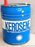 5 gallon Blue and white kerosene can with red spout.