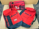 Two Marlboro packs and a smaller Marlboro Adventure Team duffel bag. Packs about 28