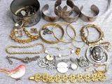 Gold and silver toned bangle and cuff bracelets, charm bracelet, Mother of Pearl accented necklace,