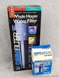 Whole house water filter, model U25; with installation kit, model QK-1. Both appear to be unused.