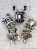 Vintage and newer reels including Pflueger Summitt Model 1993L; Hendrix Level Wind and Bronson