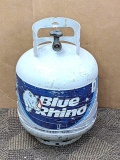 No shipping. Blue Rhino propane tank is nearly empty with newer style OPD valve. Net weight 15 lb.