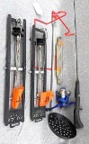 Two Polar Tip-Ups, Shakespeare ice fishing rod, a couple of rod holders and an ice fishing scoop.