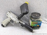 Talon Co 2 powered paint ball gun, comes with a partial container on 250 paintballs, and is in