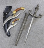 Pair of Robert Shifett knives and a wavy blade dagger, measures 14