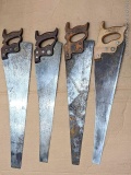 4 handsaws for use or for decoration. Longest measures 31