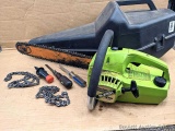 Poulan Micro XXV chain saw with black plastic hard case and owner's manual.