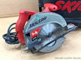 Skil 2.4 hp circular saw runs well. Comes with hard case.