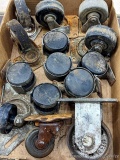 Swiveling casters, some sets, largest wheel is about 1-1/2