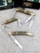 Three 35th Anniversary Frost Cutlery folding knives with original boxes. Largest is 7