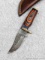 Seller notes this handmade damascus knife is 1095 and 15N20 steel. The knife has a 3