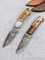 Seller notes these handmade damascus knives are 1095 and 15N20 steel. The larger knife has a 3 3/4