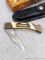 Old Smoky folding knife made by Smoky Mountain Knife Works. The knife comes with a leather sheath