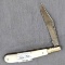 William Rodgers folding pocket knife with mother of pearl handle slabs. The knife is in good