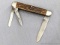 Vintage Remington UMC folding pocket knife with three blades. The knife is in overall good