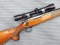 Remington Model 700 BDL Custom Deluxe bolt action rifle in .17 Remington is topped with a 2-7