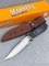 Marbles brand fixed blade knife with sheath and box. Blade, handle slabs, and fittings are tight.