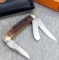 Marbles brand folding pocket knife with black case and box. Blade, handle slabs, and fittings are