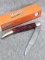Marbles brand folding pocket knife with box. Blade, handle slabs, and fittings are tights. Box