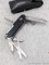 Black Victorinox Swiss Army pocket knife with sheath measures 6-1/4