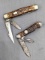 Two vintage Remington folding pocket knives with chipped bone or stag handle slabs. Both knives are