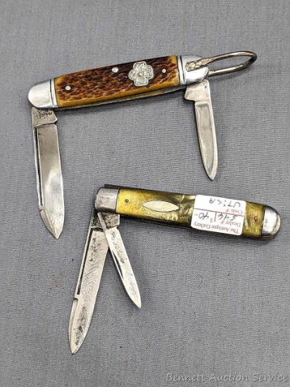Girl scouts folding pocket knife by Utica, and another similar folding knife also by Utica. Both
