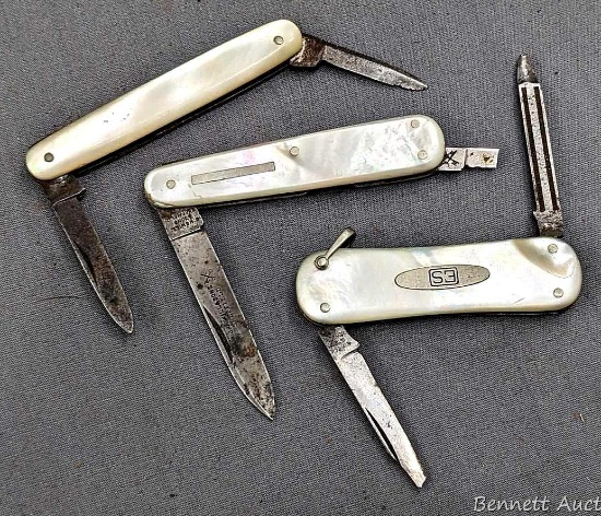 Three vintage folding pocket knives by J. Nowill, and others, all with mother of pearl handles. The