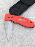 Milwaukee Fastback locking folding knife with Bench Made brand sheath. Measures 7-3/4