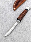 Case XX M3-FINN SS small hunting knife with Case XX leather sheath reminds me of a bird or trout