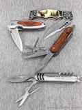 Two promotional and two other folding pocket knives up to 8-1/4