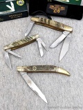 Three 35th Anniversary Frost Cutlery folding knives with original boxes. Largest is 7