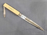 Remington UMC letter opener knife with a pen blade, the gold plating has minimal wear through,