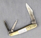 Vintage Remington folding pocket knife with two blades and a nail file. The knife is in overall good