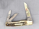Frank Buster & Sons Fighting Rooster folding pocket knife with three blades. The main blade is