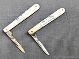 Two vintage single blade folding pocket knives with mother of pearl handles. The knives are both in