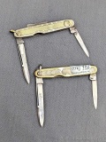 Two vintage Remington UMC folding pocket knives with what looks like and may be white gold and