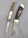 Pair of Parker damascus steel fixed blade knives. The longer knife is in spectacular condition with
