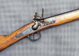 Stoeger Arms flintlock black powder muzzleloading rifle was made in Belgium.