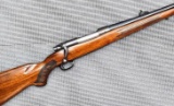 Winchester Model 70 bolt action rifle chambered .338 Win Mag. The 23