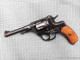 Russian Model 1895 revolver chambered 7.62x38R. This unique revolver moves the cylinder forward upon