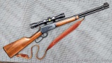 Winchester Model 94 lever action .30-30 Win rifle is outfitted with a Tasco W4X32-1 rifle scope