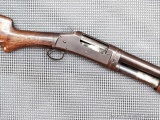 Winchester model 1897 pump action shotgun. The 26