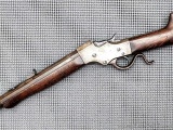 J. Stevens Model 1894 Favorite rifle chambered .32 long rimfire. The 1/3 octagon barrel is 24