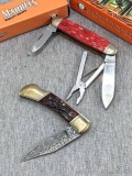 Couple of Marbles brand folding pocket knives, both with boxes. Red knife box labeled MR151 and