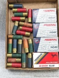 20 Rounds of Federal 12 gauge ammunition with rifled slugs, also a handful of vintage shotshells