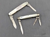 Two vintage folding pocket knives appear to be marked Butcher, and Frankfurt. They have mother of