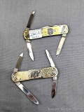 Two ornate Sweden made folding pocket knives made by Eka and other. The knives are in good condition